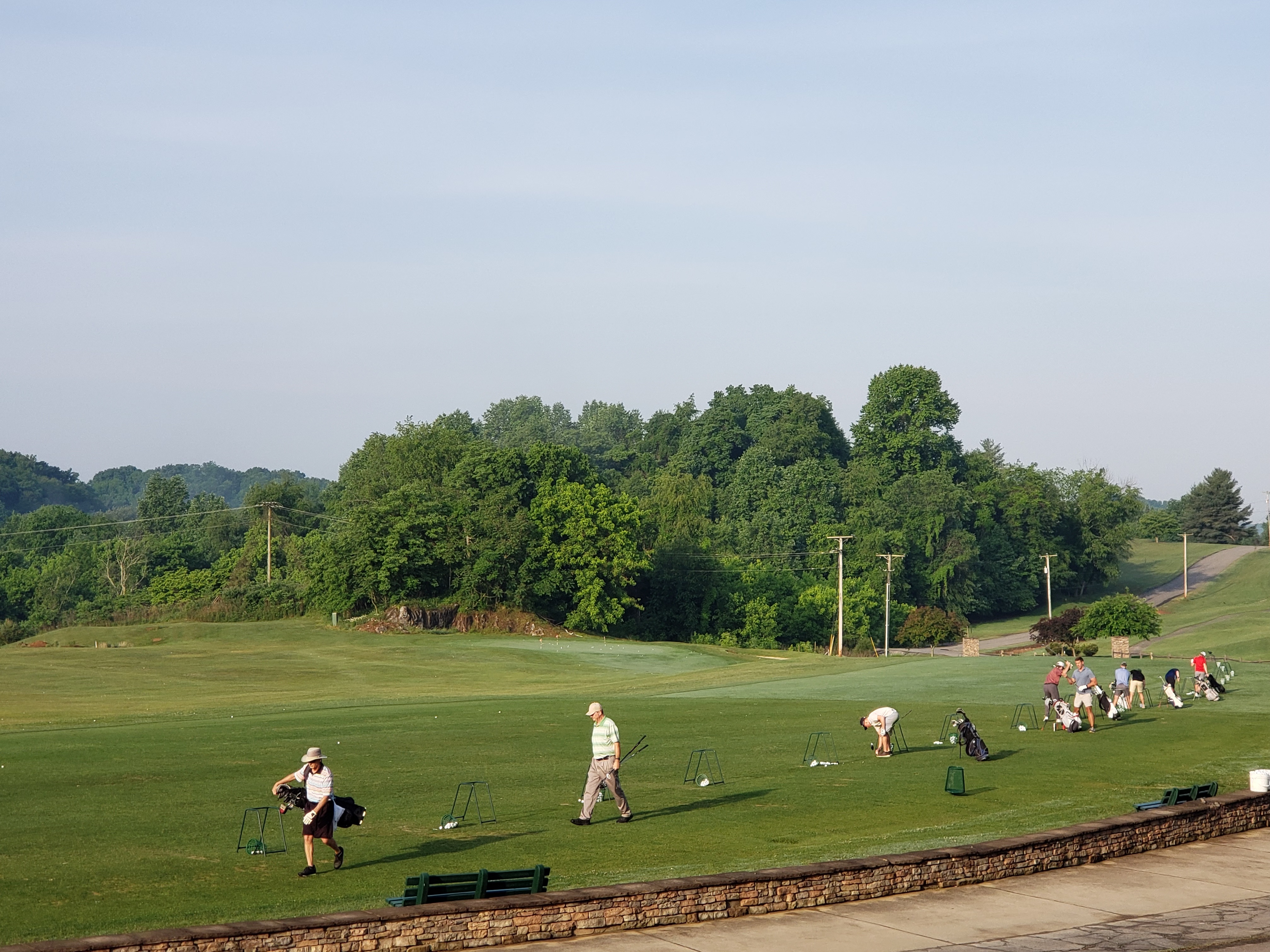 Golfers walking on golf course